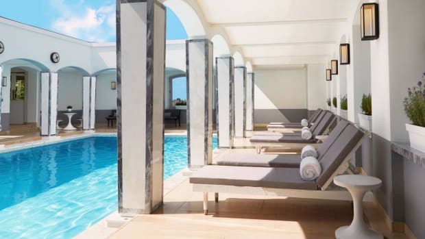 while-london-might-not-be-the-first-destination-you-think-of-when-it-comes-to-rooftop-pools-the-berkeley-hotel-in-london-boasts-a-health-club-spa-and-best-of-all-swanky-rooftop-pool-its-covered-in-iridescent-white-and-gold-mosaic-and-features-a-retra.jpg