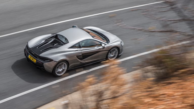 Watch Neck-Snapping Footage of a McLaren 570S on Both Road and Track