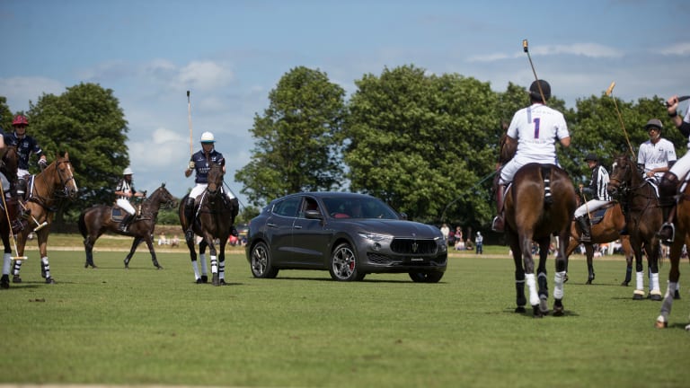 Watch the Maserati Levante Race Thoroughbred Horses Through the English Countryside
