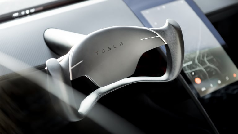 Tesla Shocks the Car World With Surprise Supercar Reveal