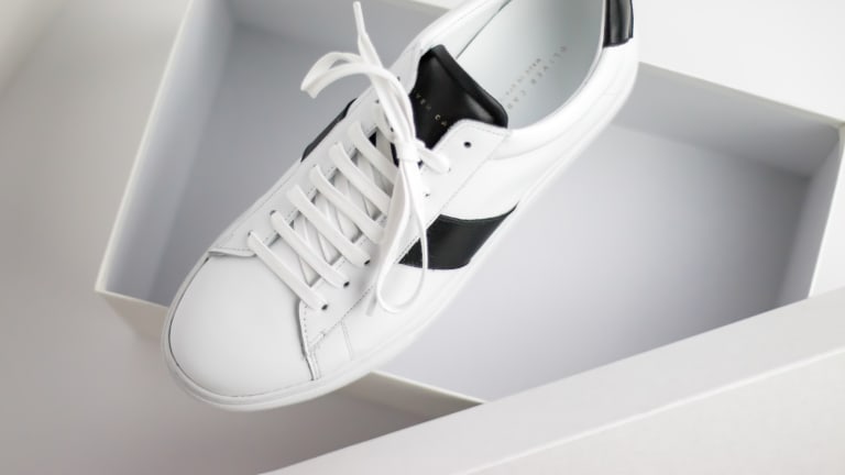 White sneakers clearance black stripes
