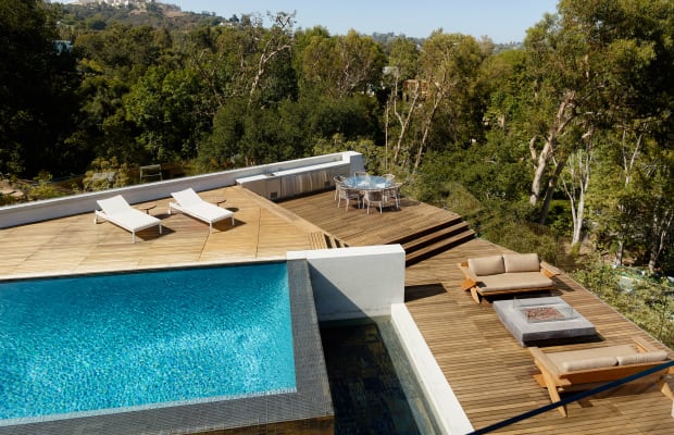 Grass-Covered Roof, Modern Style & Gorgeous Pool Deck: This Home Has It All