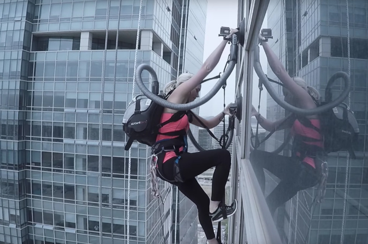 Watch A Pro Rock Climber Scale A Skyscraper Using Only Two Vacuums Airows