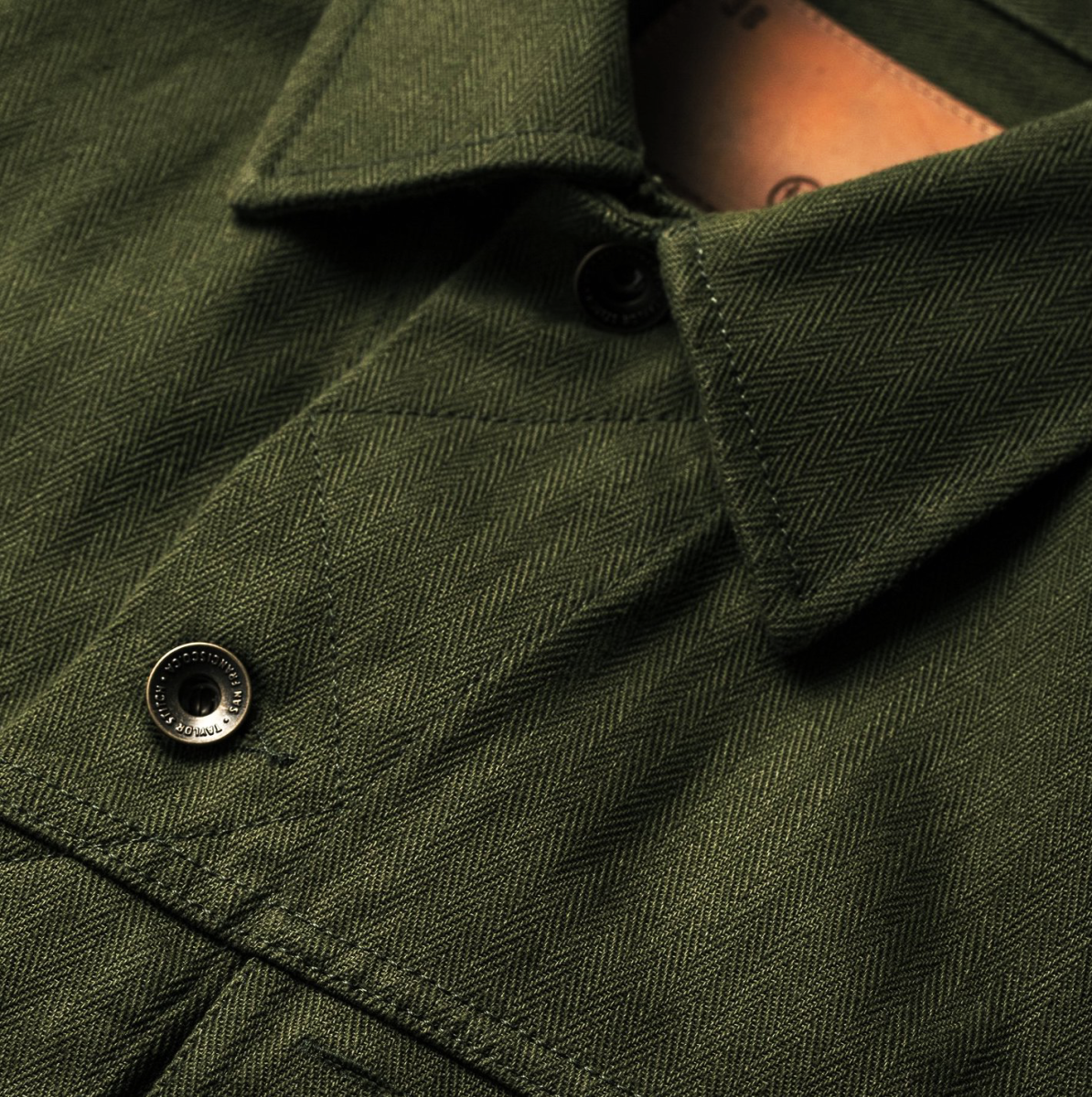 the long haul jacket in washed olive herringbone
